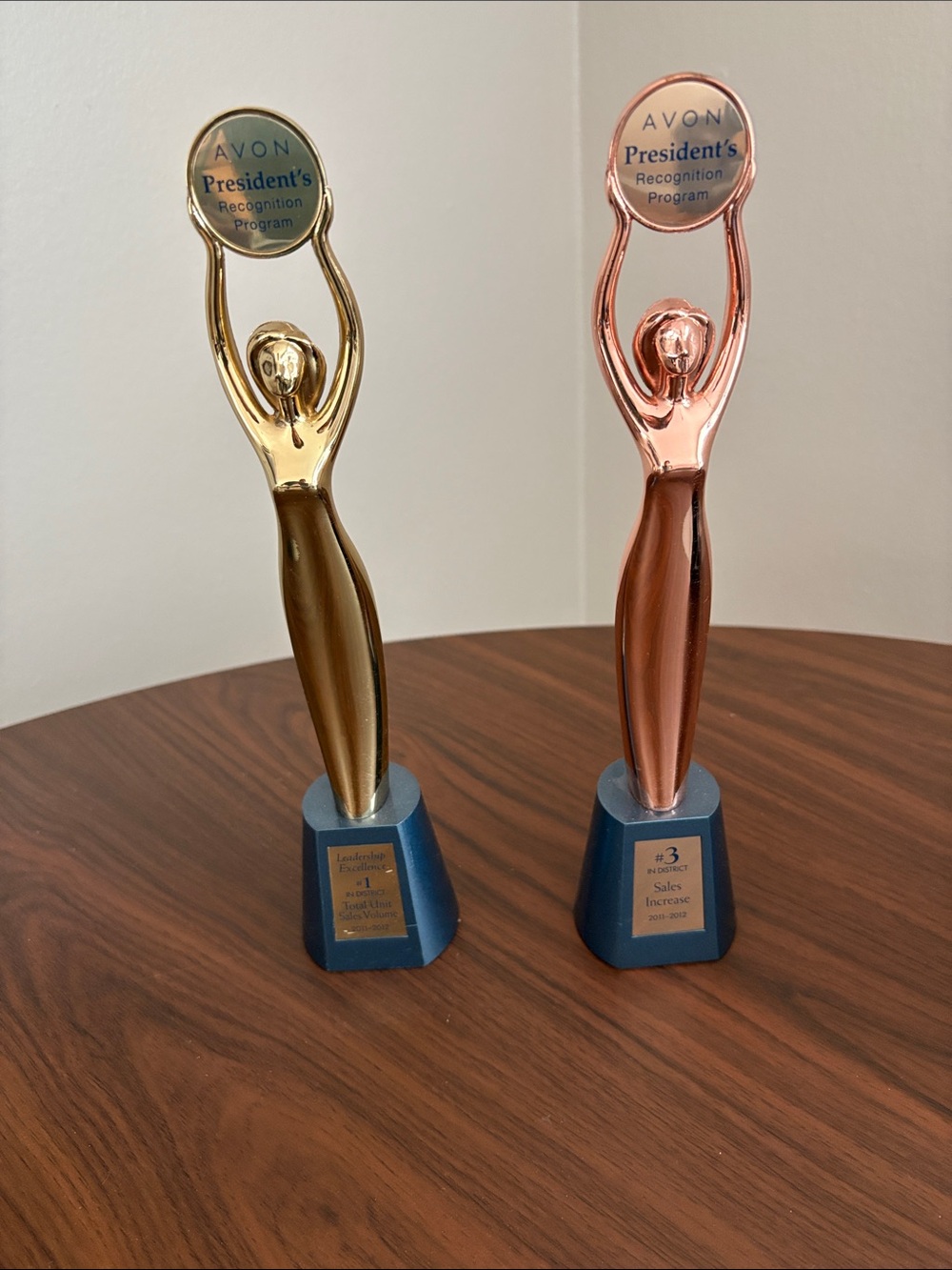 Avon Gold and Rose Gold Recognition Figurine Trophies on Blue Bases